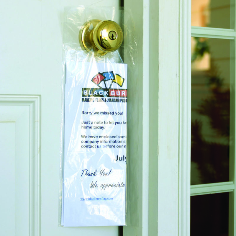 Door hanger bag hanging from front door